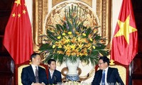 Bộ trưởng Ngoại giao Phạm Bình Minh tiếp Bí thư Khu ủy Khu tự trị dân tộc Choang