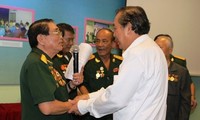 Phó Thủ tướng Thường trực Trương Hòa Bình dự buổi họp mặt chiến sĩ cách mạng từng bị địch bắt tù đày