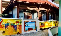 Colorful murals of Nhon Ly fishing village