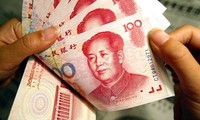 จีนปรับลดค่าเงินหยวนต่อไป