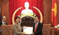 Lao NA Chairwoman visits southern Vietnam