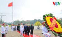 Leaders pay floral tribute to late President