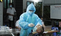 Vietnam records 9,690 new COVID-19 cases on Sunday