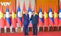 Vietnam, Laos pledge stronger ties in all fields