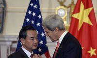 China, US pledge to improve communications on international issues