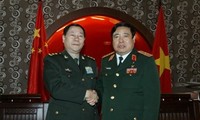 Vietnam, China continue to boost military ties