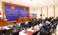 Vietnam y Laos comparten experiencias sobre desarrollo socioeconómico posterior al covid-19 