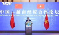 Premier vietnamita asiste al Foro de Cooperación Comercial e Inversión con China