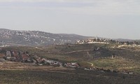 Settlers build two new West Bank outposts