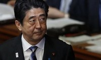Japan PM says China must stay open to dialog
