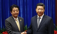 China urges Japan to abide by four-point agreement