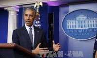 Obama urges Trump to send “signals of unity”