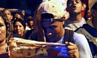 Hugo Chavez: Venezuelans mourn death of charismatic leader  