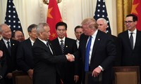 Estados Unidos y China acuerdan seguir adelante con su pacto comercial