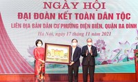 Celebración de la Fiesta de la Unidad Nacional y el 91 aniversario del Día del Frente de la Patria de Vietnam
