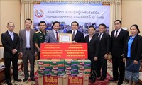 Lào tiếp nhận hỗ trợ của cộng đồng người Việt tại Lào giúp người dân vùng thiên tai