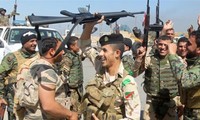Koalisi   Internasional   melakukan serangan udara  terhadap Tikrit untuk melawan IS