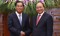 Нгуен Суан Фук принял министра планирования и инвестиций Лаоса