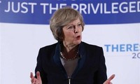 Theresa May évoque un accord de transition pour amortir le Brexit