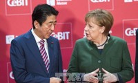 Abe et Merkel plaident pour le libre-échange