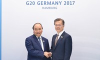 Nguyên Xuân Phuc rencontre le président sud-coréen et le Premier ministre australien