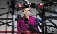  Angela Merkel ouvre «avec optimisme» les négociations pour former une majorité