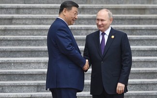 Xi Jinping conversa con Putin en Beijing