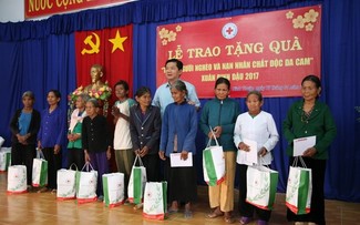 Poor people and AO victims helped to enjoy Tet