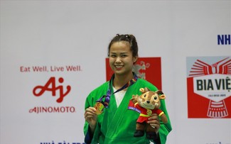 Female martial artist fetches Vietnam's first gold at SEA Games 31