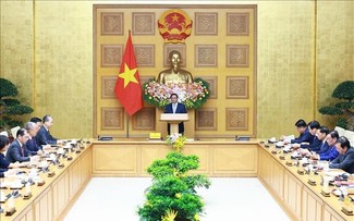Premierminister Pham Minh Chinh führt Gespräch mit chinesischen Unternehmen über grüne und digitale Wirtschaft
