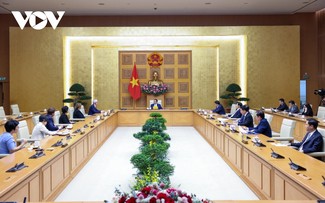 Premierminister Pham Minh Chinh empfängt Geschäftsführer des US-Konzerns Apple Tim Cook