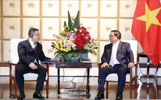 Pham Minh Chinh rencontre les dirigeants de grandes entreprises chinoises à Dalian