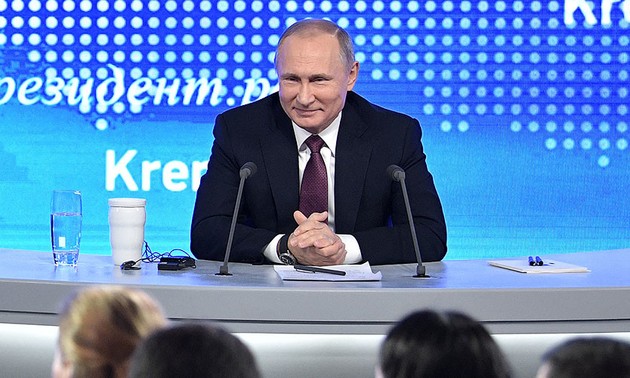 Vladimir Putin holds annual marathon press conference