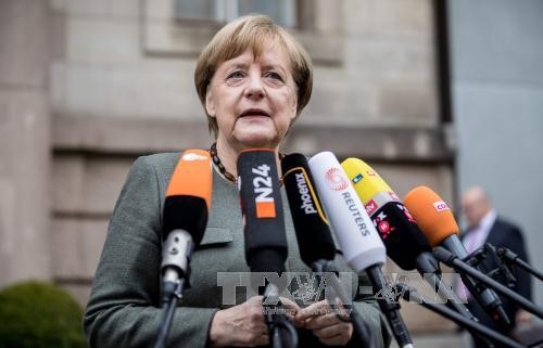 Angela Merkel plans to get government in place soon