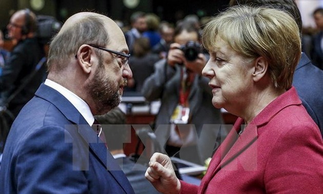 Merkel, Social Democrats seek clarity on coalition talks