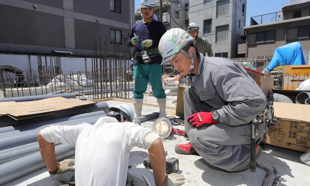Japan enacts controversial law to accept foreign workers