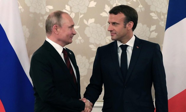 France, Russia voice cautious optimism on Ukraine