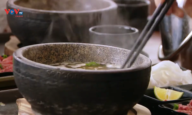 Beef pho served in hot stone bowls – Hanoi must-try