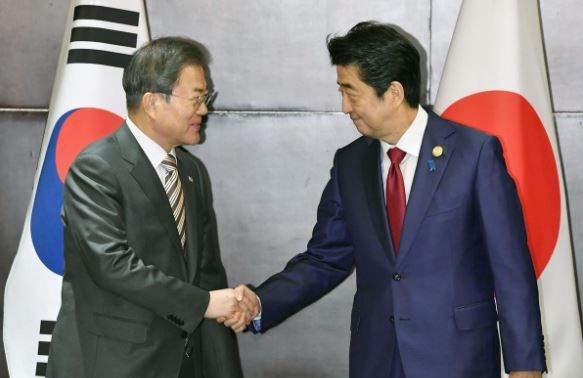 Japan urges South Korea to take steps in resolving bilateral row