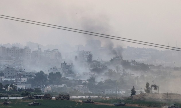 Israeli forces attack north Gaza's main city from both sides