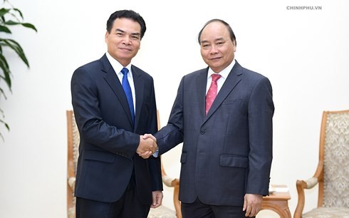 PM Nguyen Xuan Phuc menerima Menteri, Kepala Kantor Istana PM Laos, Phet Phomphiphak