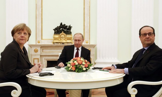 Spitzenpolitiker Russlands, Deutschlands und Frankreichs diskutieren die Ukraine-Krise