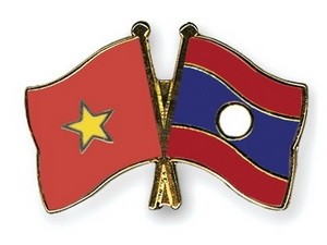 Partei- und Staatschefs Vietnams beglückwünschen Laos zu seinem Nationalfeiertag