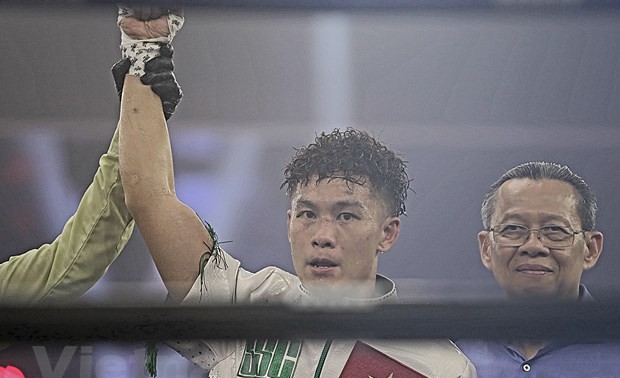Der vietnamesische Boxer Trinh The Long gewinnt den Silbergürtel von WBC Asia