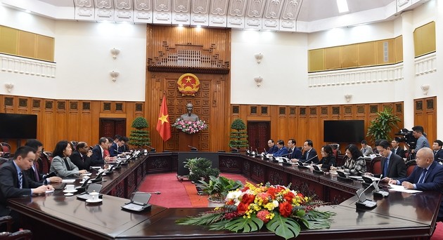 Vize-Premierminister Tran Luu Quang empfängt den zweiten Minister für Handel und Industrie Singapurs