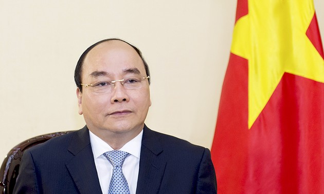 阮春福：越南希望继续在国家发展事业中获得OECD的支持与同行