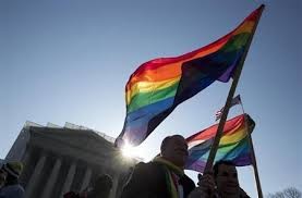 Hollande signs bill legalizing gay marriage in France