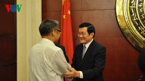 President Truong Tan Sang meets Chinese scholars 