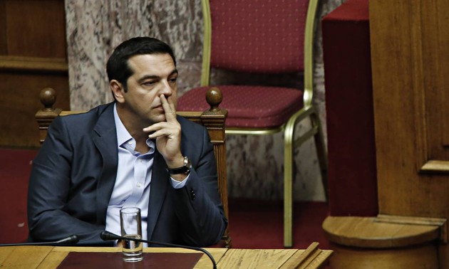 Greece Approves First Austerity Bill