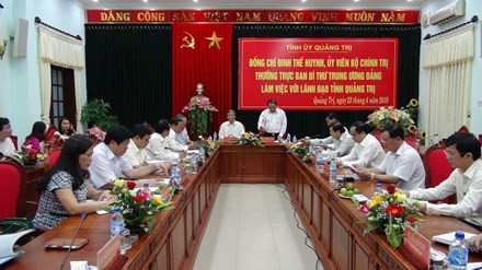 Politburo member Dinh The Huynh works with Quang Tri 